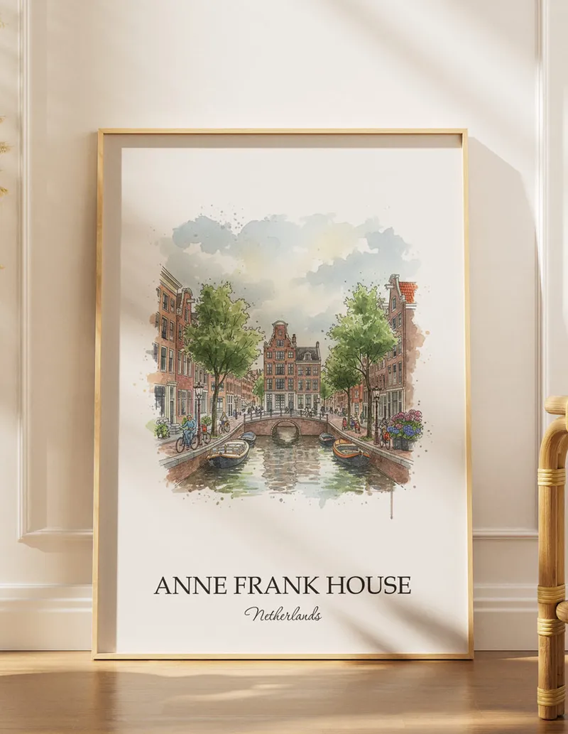Framed wall art featuring Anne Frank House in Netherlands in a light wood frame leaning on the floor.