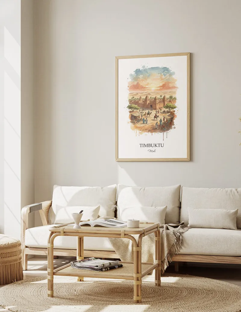 A gorgeous boho-inspired living space with a framed vintage travel poster of Timbuktu in Mali on display.