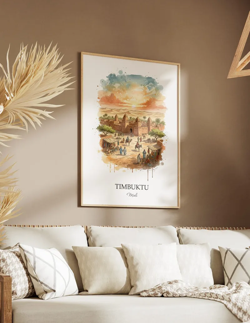 Cozy, well-lit workspace with a minimalist poster of Timbuktu, Mali in a light frame sitting on the desk.