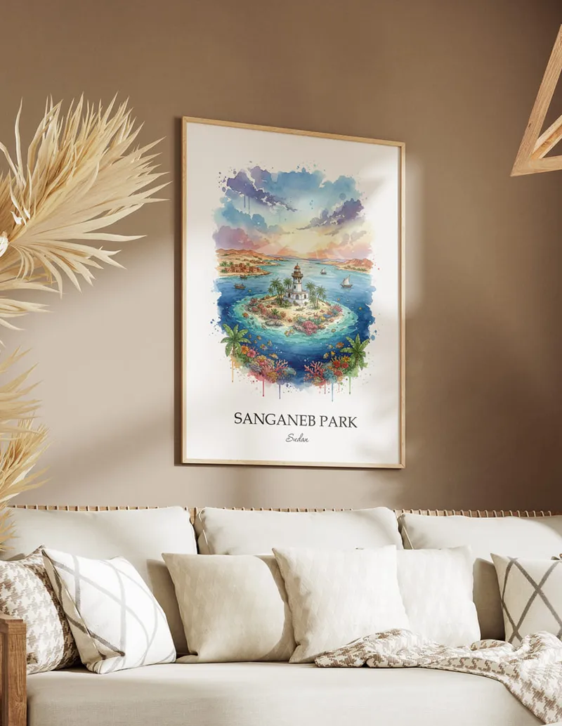 Cozy, well-lit workspace with a minimalist poster of Sanganeb Park, Sudan in a light frame sitting on the desk.