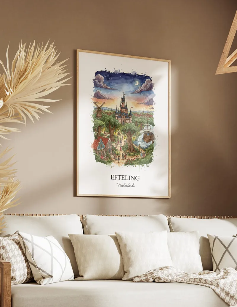Vintage travel poster of Efteling, Netherlands in a light frame displayed above a sofa in a bright boho interior.