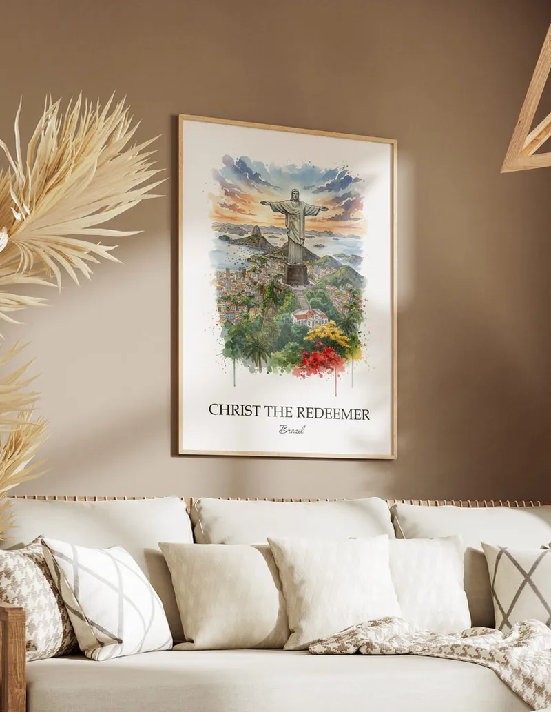 Cozy, well-lit workspace with a minimalist poster of Christ the Redeemer, Brazil in a light frame sitting on the desk.