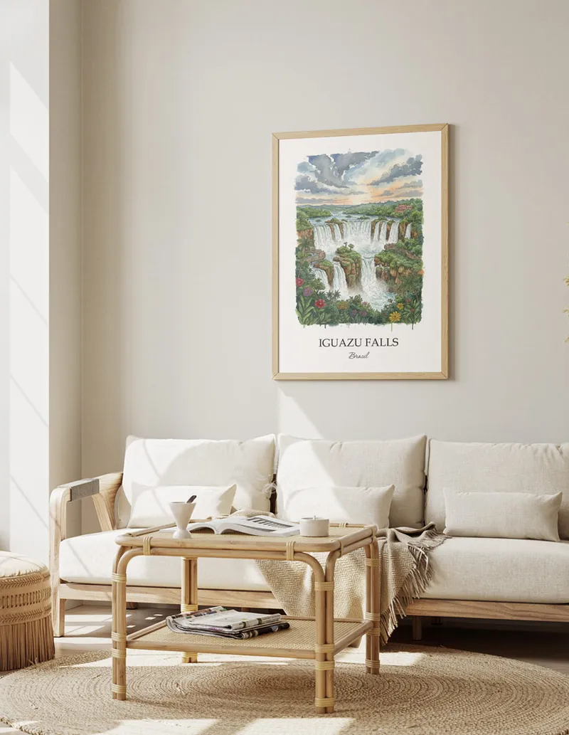 A gorgeous boho-inspired living space with a framed vintage travel poster of Iguazu Falls in Brazil on display.