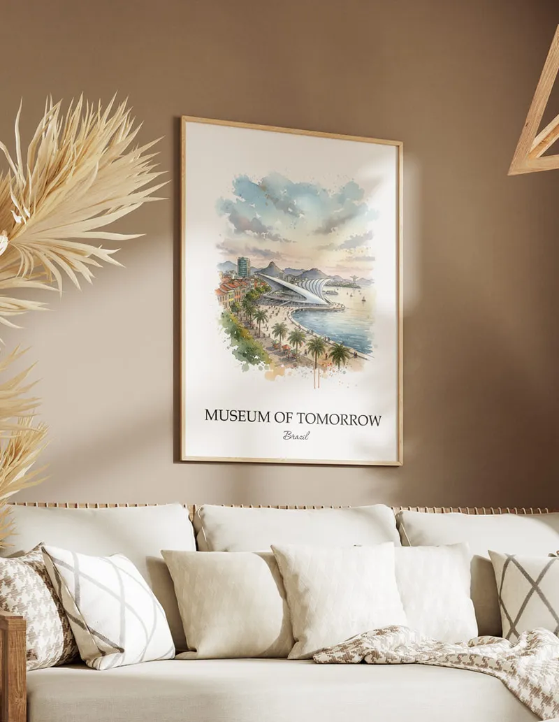 Cozy, well-lit workspace with a minimalist poster of Museum of Tomorrow, Brazil in a light frame sitting on the desk.