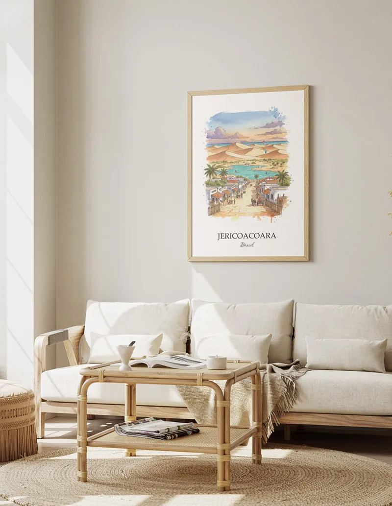 A gorgeous boho-inspired living space with a framed vintage travel poster of Jericoacoara in Brazil on display.