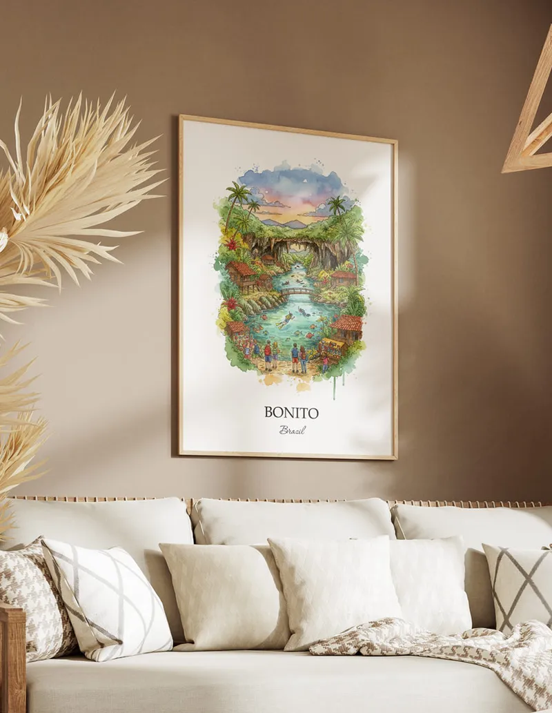 Cozy, well-lit workspace with a minimalist poster of Bonito, Brazil in a light frame sitting on the desk.