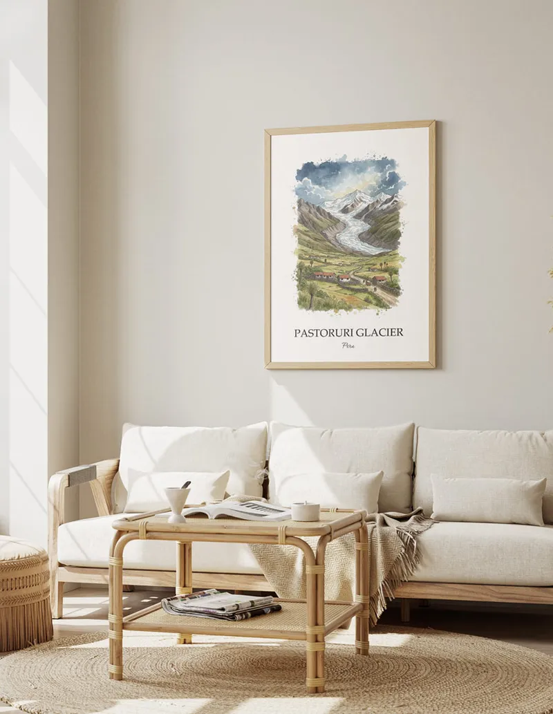 A gorgeous boho-inspired living space with a framed vintage travel poster of Pastoruri Glacier in Peru on display.