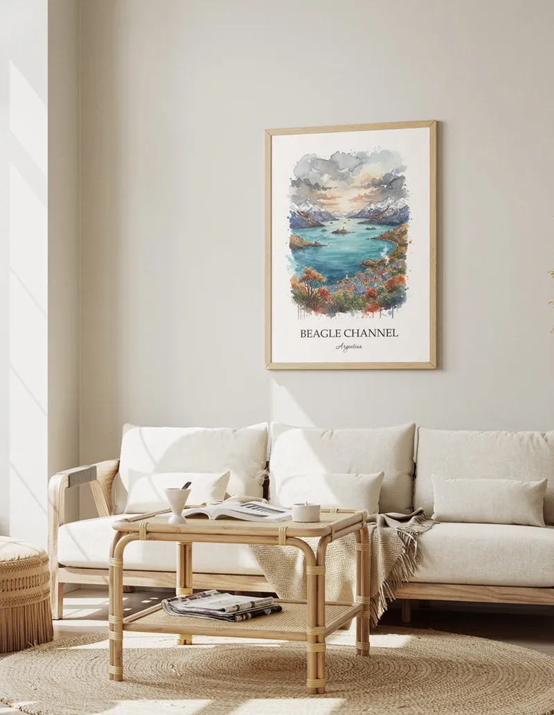 Framed wall art featuring Beagle Channel, Argentina in a light wood frame hanging above a sofa in a modern living room.